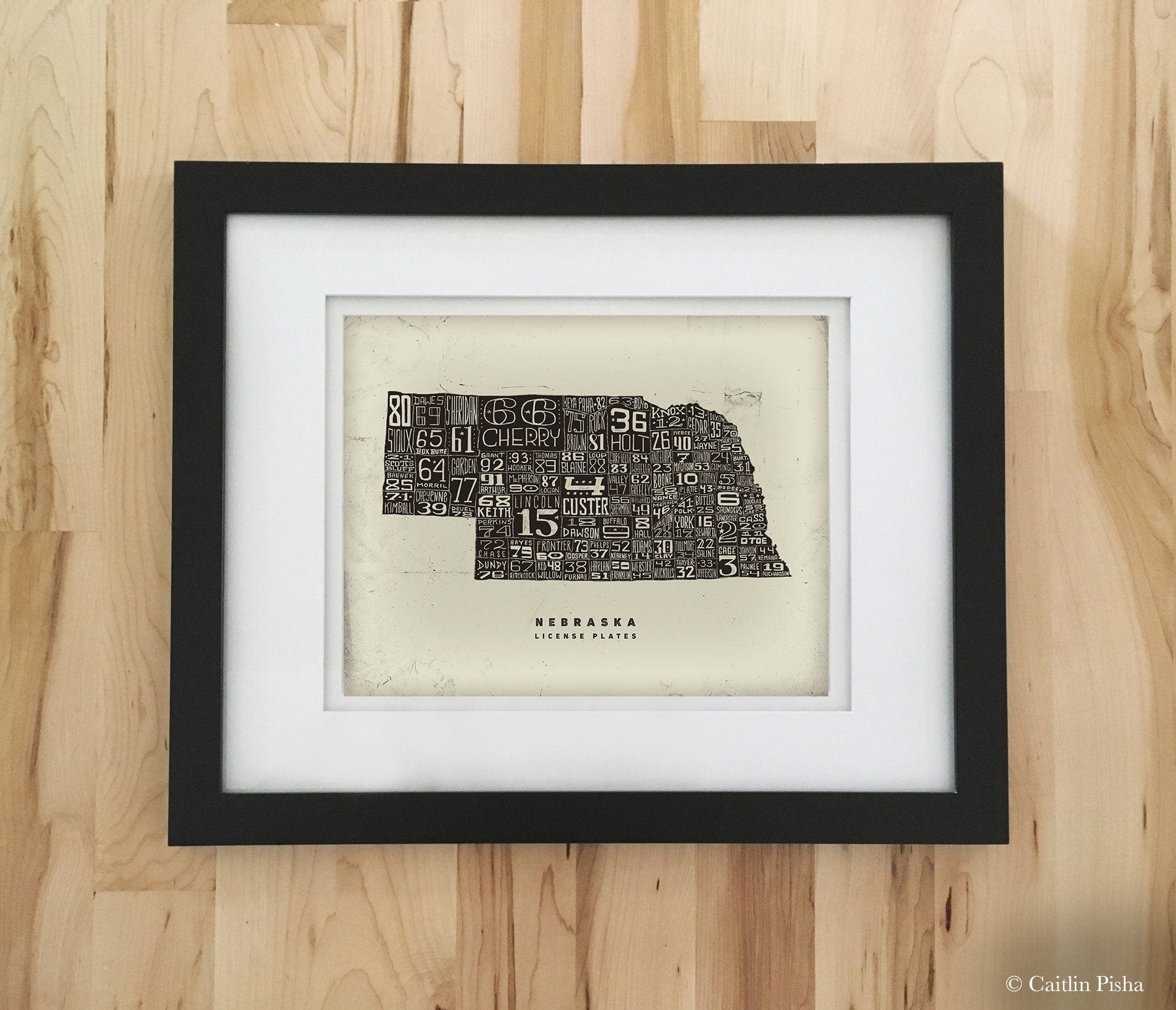 Nebraska License Plate Poster – Warm Black on Cream Background