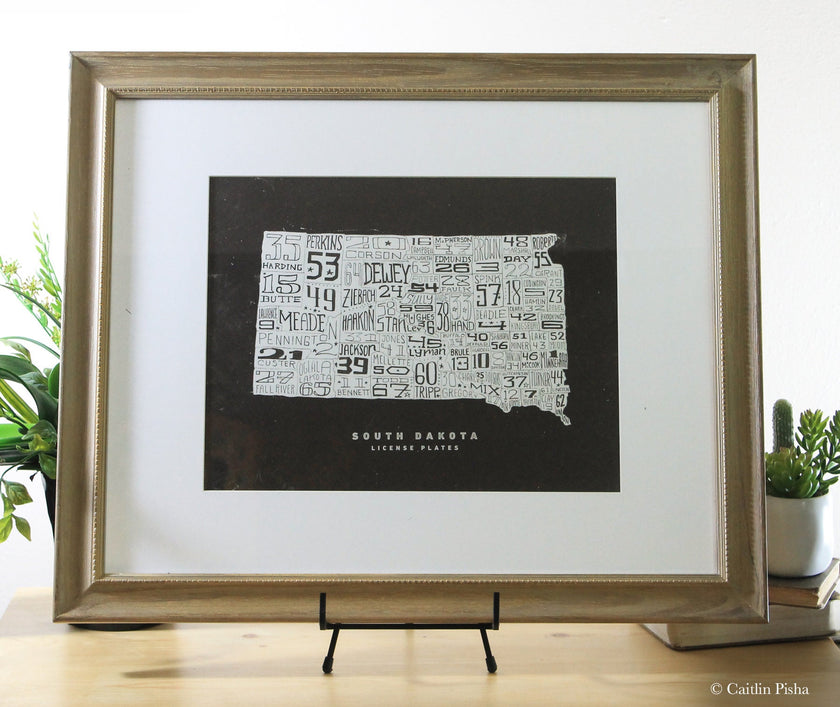 South Dakota License Plate Poster – Cream on Brown Background