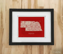 Nebraska License Plate Poster – Cream on Red Background